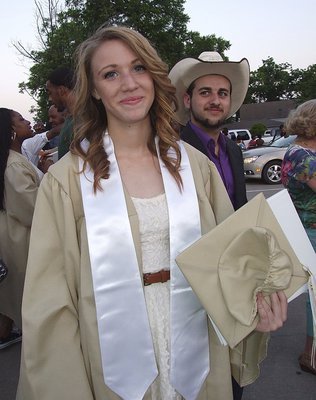Image: Brooke Miller begins to break a smile after becoming a 2013 graduate of Italy High School.