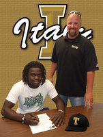 Image: 2013 Italy High School graduate, Ryheem Walker, will continue playing football at the next level after signing his letter of intent to play for the Tyler Junior College Apaches with Italy AD/HFC on hand to share in the moment. Walker received a partial scholarship to cover tuition and meals and financial aid to cover living expenses. Awesome!