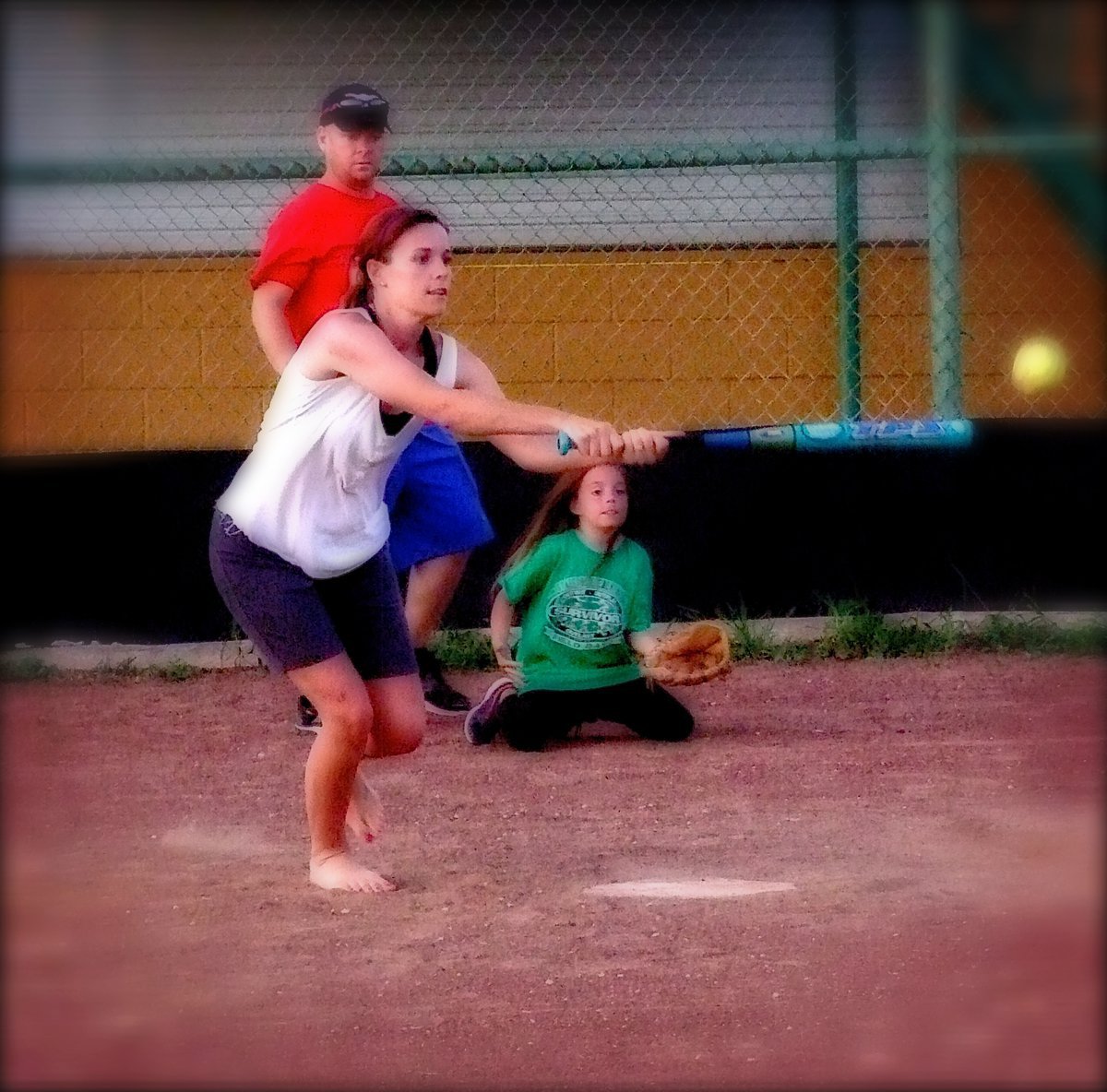 Image: Jenna Chambers gives slap hitting a try.