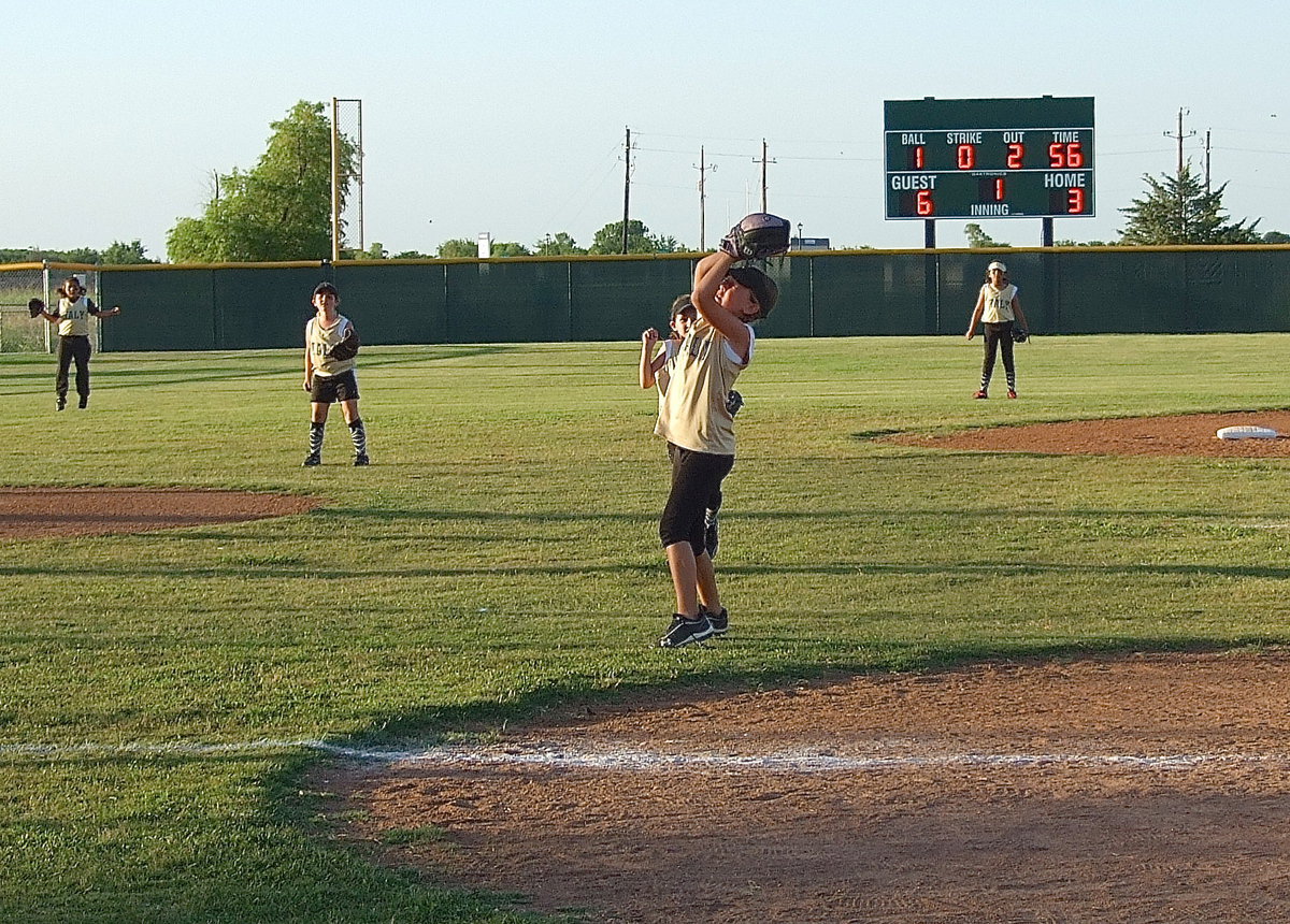 Image: That’s Karley Sigler getting under a popup and making the catch for an out against Waxahachie in the championship game.