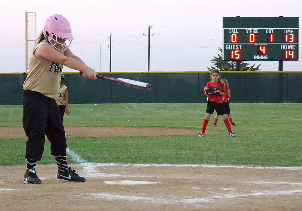 Image: Italy’s Brianna Hall shows her coach, Ken Cate, where to pitch the ball.