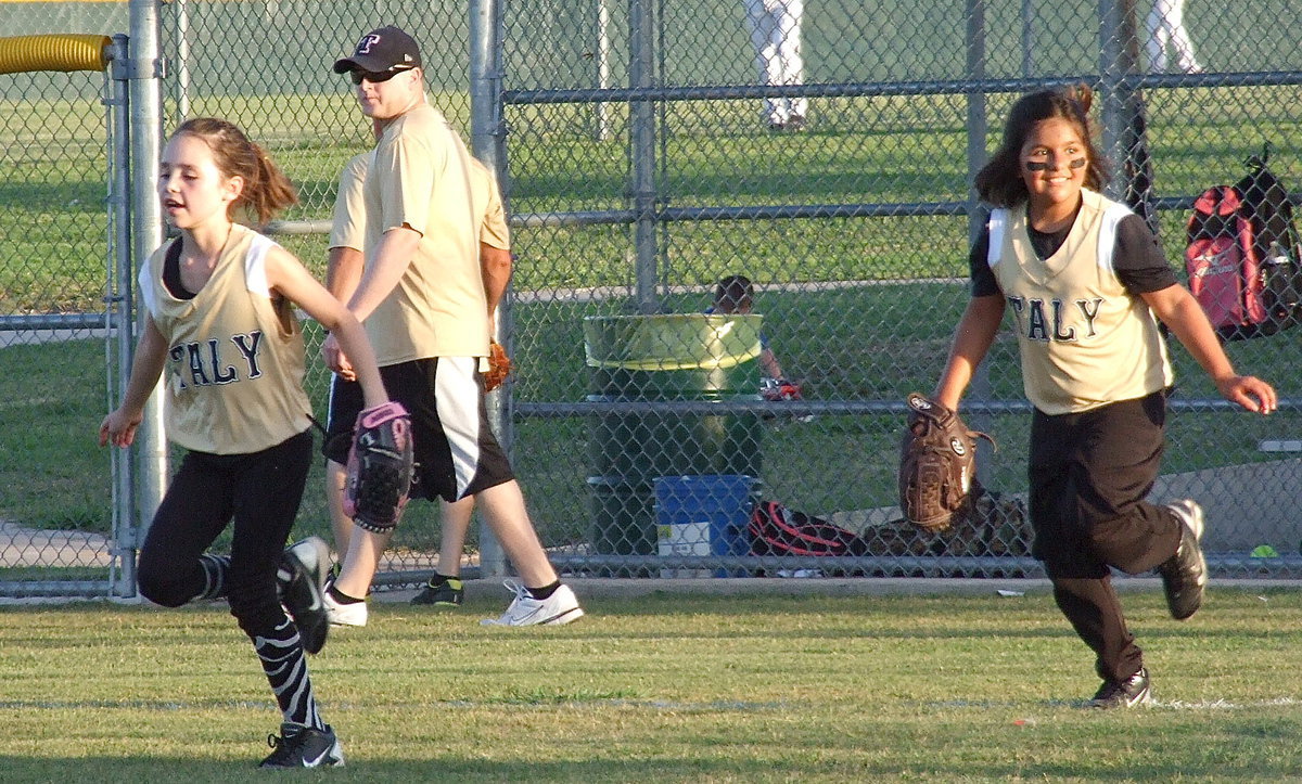 Image: Italy’s, Emily Janek and Evie South take the field.