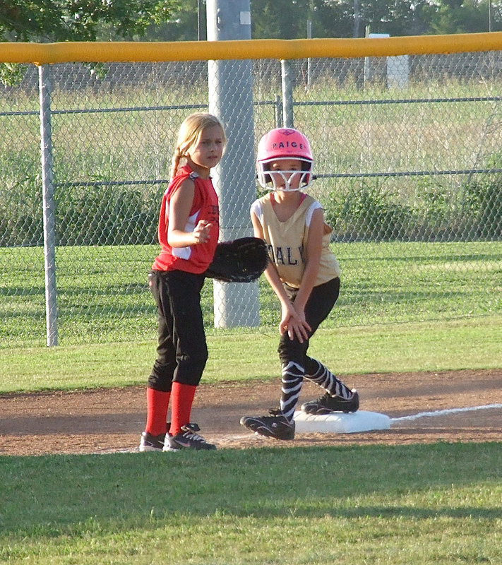 Image: Paige Butler reaches third base for Italy.