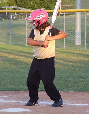 Image: Evie “Southpaw” South is ready to send this ball right into the outfield.