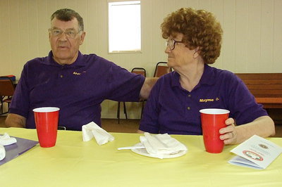 Image: Alvin Onstad and his wife Mayme Onstad discuss Lion’s Club membership concerns with those attending.