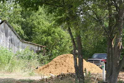 Image: Very innocent load of sand brought in by a dump truck.