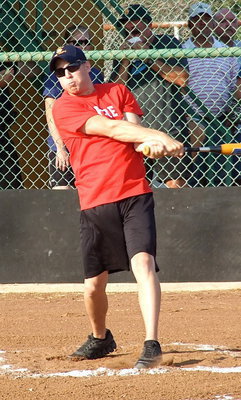 Image: Italy Firefighter Danny Miller has plenty of muscle while competing in the homerun derby.