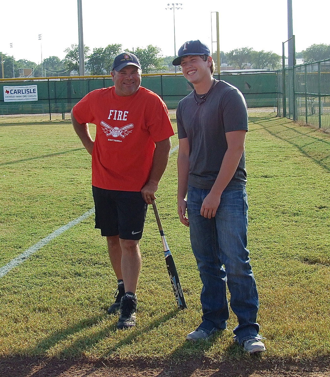 Image: Jackie Cate and Justin Buchanan monitor their competition during the homemrun derby.