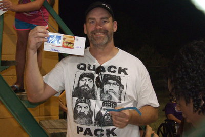 Image: Doug Nelson of Italy receives a gift certificate.