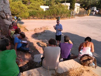 Image: Pastor Joseph Barrett speaks to members of the Central Baptist Church mission trip prior to heading up Mars Hill where the Apostle Paul preached in Athens about the “Unknown God.”