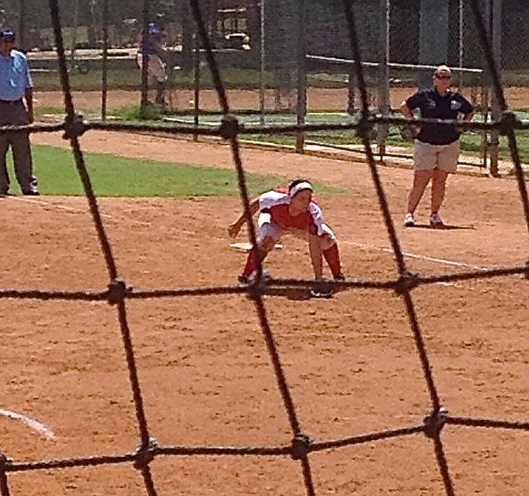 Image: Red All-Star’s Alyssa Richards plays a couple of innings at first base during the 2013 Texas Girls Coaches Association All-Star Softball Game in Austin.