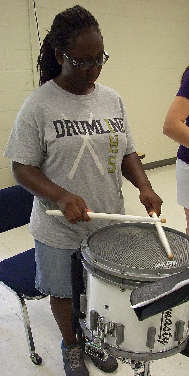 Image: Brenya Williams finds the rhythm with her snare drum.