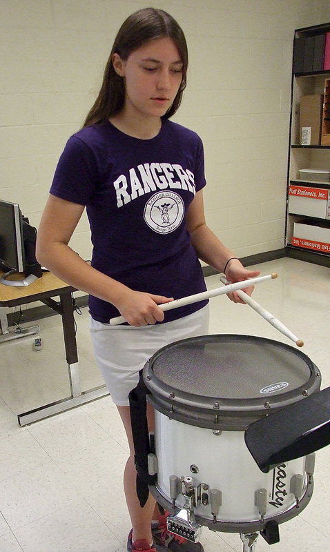 Image: Whitney Wolaver sets the tome for the snare division as captain.