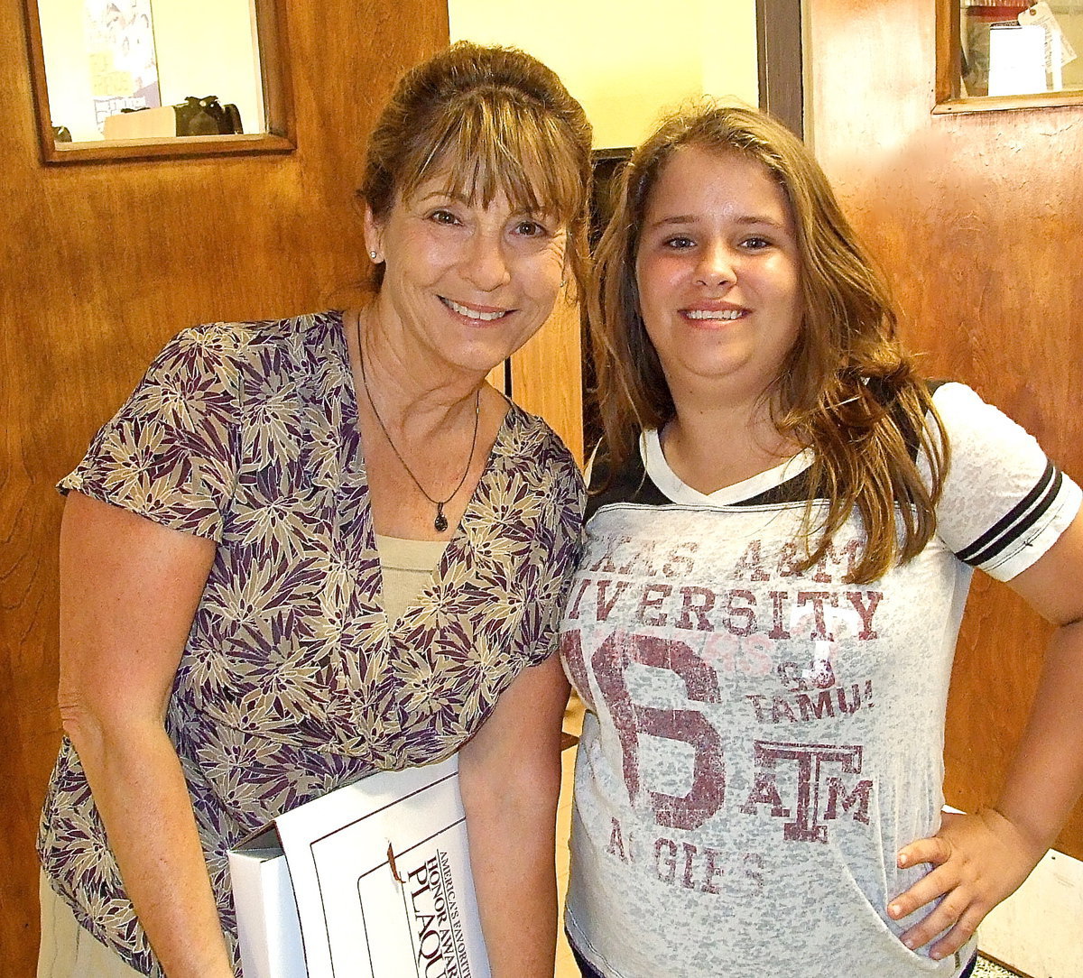 Image: Jill Varner congratulates Mrs. Margie Davis and wishes her all the best now that she has retired from the Italy ISD.