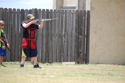 Image: Hunter Hinz shoots in the junior division of American Skeet at the state games.