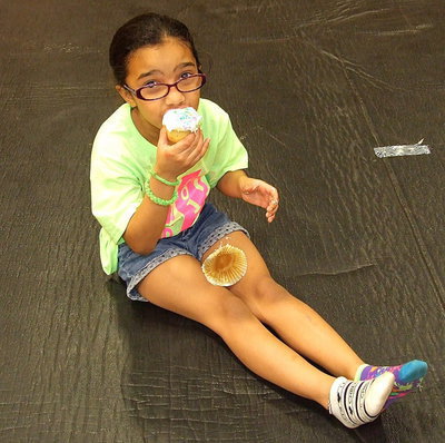 Image: Yum! Sicily Johnson agrees cupcakes are a great way to end the mini cheer camp!!