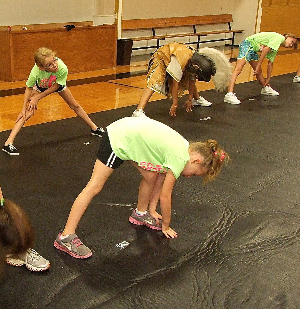 Image: The campers along with Italy’s mascots stretch it out for the upcoming school year.