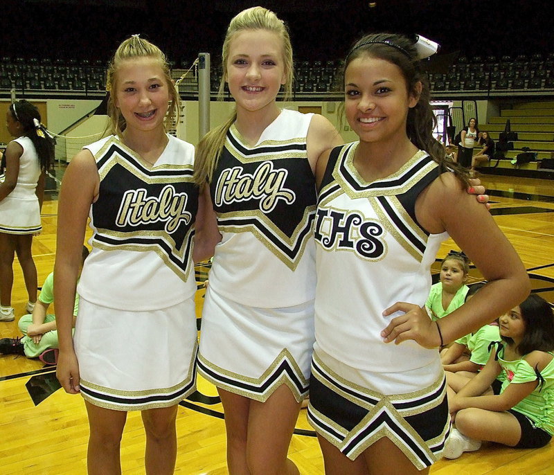 Image: Maegan Connor, Annie Perry and Ashlyn Jacinto help host the 2013 Mini Italy Cheer Camp along with the varsity and Junior high cheer mates.