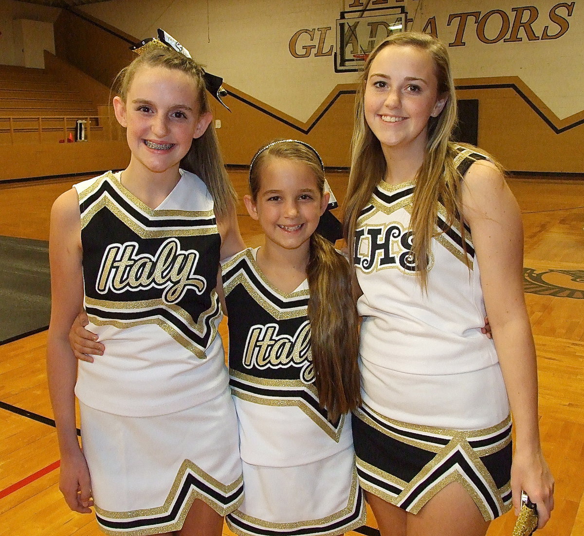 Image: Three cheers for Italy’s spirit sisters Kirby Nelson, Karley Nelson and Kelsey Nelson, “Hip hip hoorah! Hip hip hoorah! Hip hip hoorah!!!”