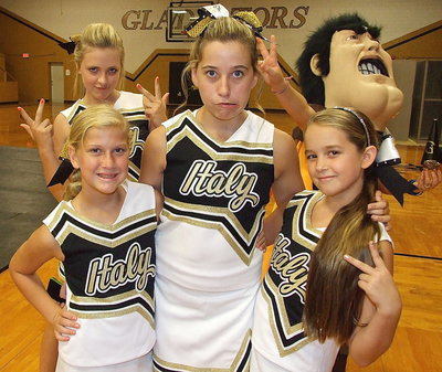 Image: Annie Perry, Hannah Haight, Karson Holley, Karley Nelson and one of the Gladiator mascots are all about world peace.
