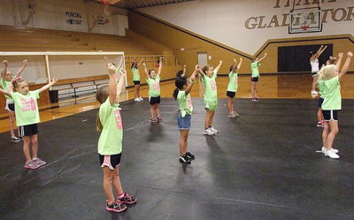 Image: The mini campers execute a cheer.