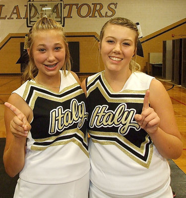Image: Italy cheerleaders Maegan Connor and Sydney Weeks are proud of their school.