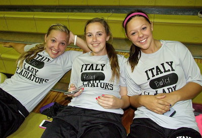Image: Jaclynn Lewis, Kelsey Nelson and Bailey Eubank kick back and relax before the start of Midnight Madness.