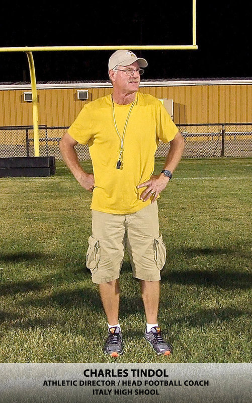 Image: Italy ISD’s new Athletic Director/Head Football Coach Charles Tindol kicks in the 2013-2014 school year with a smile during Midnight Madness which began Monday morning at 12:01 a.m. The Gladiators ran their first practice on Willis Field while the Lady Gladiators, guided by first-year Head Volleyball Coach Morgan Mathews, practiced inside Italy Coliseum.