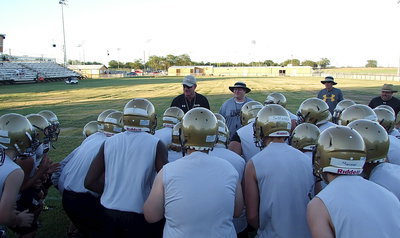 Image: Coach Tindol and his staff bring to a close a long but exciting first day of practices on Monday.