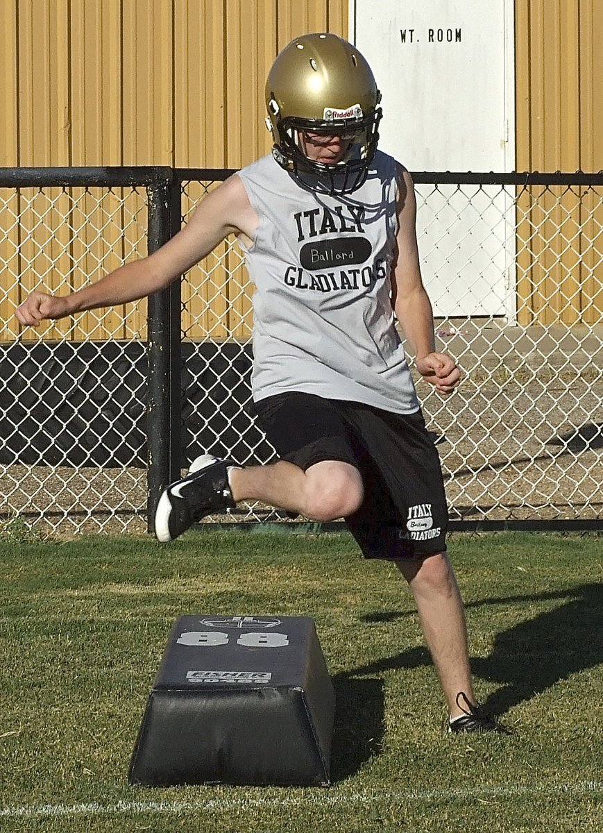 Image: Italy freshman Hunter Ballard flies thru a garbage drill for defensive players.