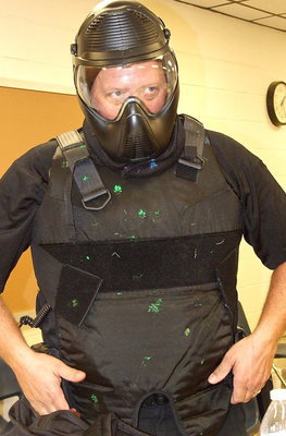 Image: Italy Police Chief Diron Hill gets geared up to participate in a Response To Active Shooter Training – School Based simulation drill inside Italy High School. Mission? Take down the gunmen, save the victims.