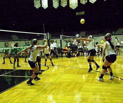 Image: Monserrat Figueroa(14) keeps the ball live with a bump to her teammates.