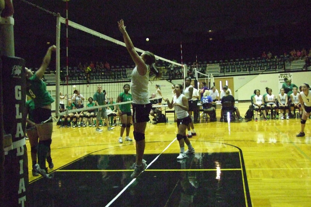 Image: Lillie Perry(12) patrols the net with help from Ashlyn Jacinto and Janae Robertson.