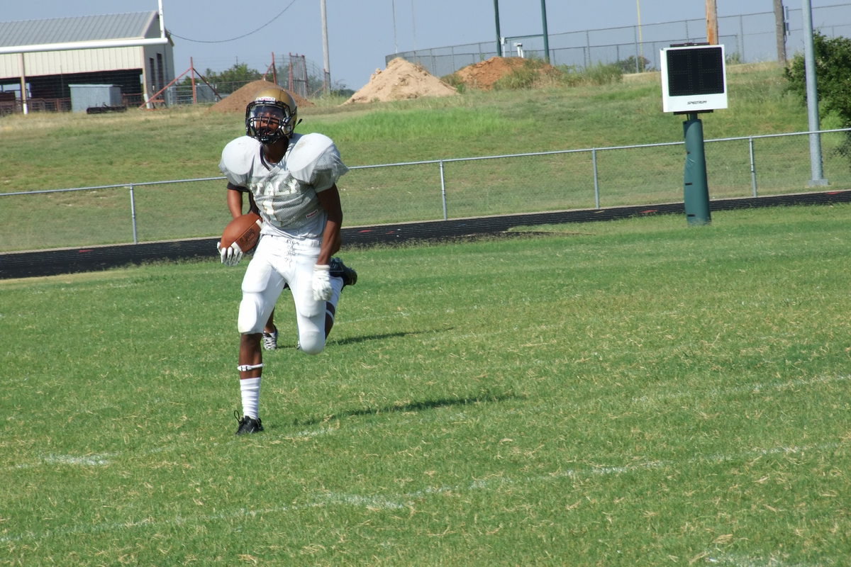 Image: Trevon Robertson(1) intercepts a Valley Mills pass attempt and has nothing but green grass in front of him before the whistles blew the play dead as a precaution.