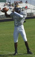 Image: Italy’s quarterback TaMarcus Sheppard(8) prepares to test his new team against Valley Mills during Italy’s 1st scrimmage of 2013.