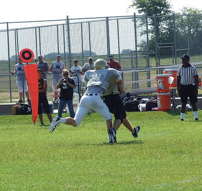 Image: Italy cornerback Cody Boyd(11) comes up to keep Valley Mills from turning in a big play.