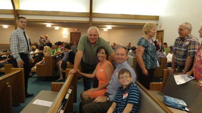 Image: Steven Crowell visits with Jerry and Jana Cockerham Burch and their son of Stephenville at Central Baptist Church’s anniversary celebration.