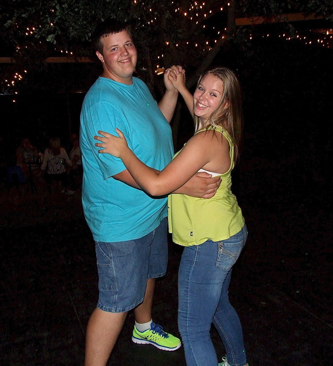 Image: Zac Mercer and Tia Russell enjoy dancing and spending time together during the bash.