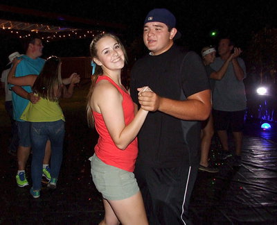 Image: Kevin Roldan and Kelsey Nelson share a dance and a memory.