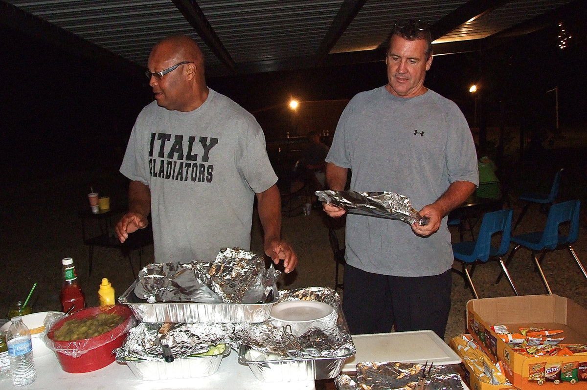 Image: Taking care of the masses are Larry Mayberry and Russ Lewis.