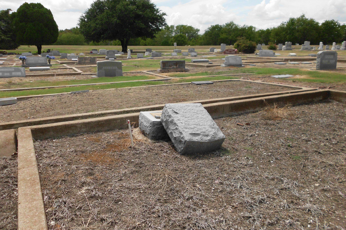 Image: The disrespect shown to this veteran buried at the Italy cemetery is evident by the vandalism.