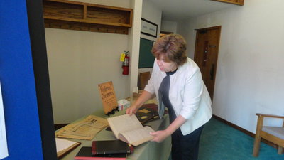 Image: Debbie Tatum views a few of the historical documents on display.