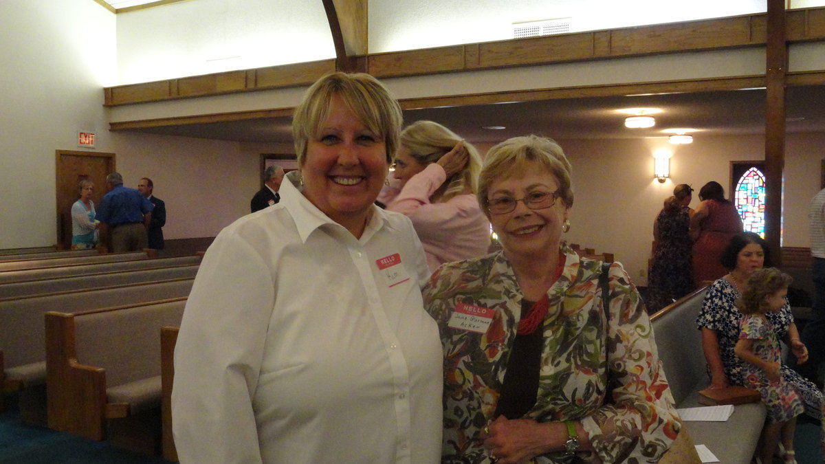 Image: Longtime member Kim Varner welcomes Jane Acker Sunday at Central Baptist Church.