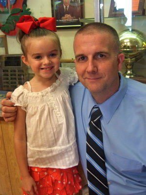 Image: Hannah Teague is going into the first grade and is happy to see Principal Tennery.