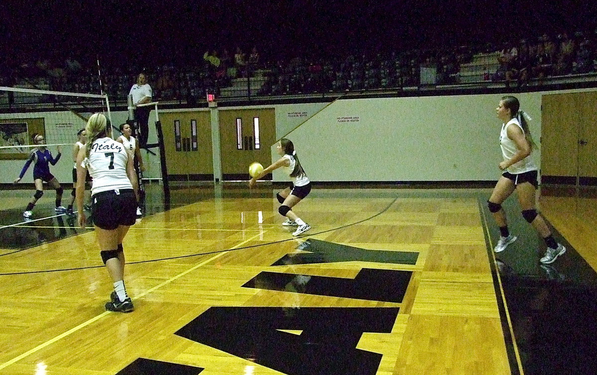 Image: Jozie Perkins(4) keeps the volley going against Venus during JV volleyball action.