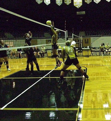 Image: Madison Washington(10) deflects a Lady Bulldog shot attempt with teammate Jaclynn Lewis(13) ready to help.