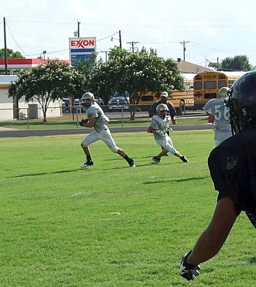 Image: Safety Ryan Connor(21) picks of a deep pass attempt by Palmer and then tries to return it for a score.