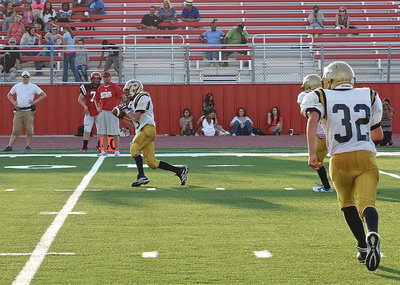 Image: Dylan McCasland(3) fields a shallow kickoff from Maypearl and then hurries forward.