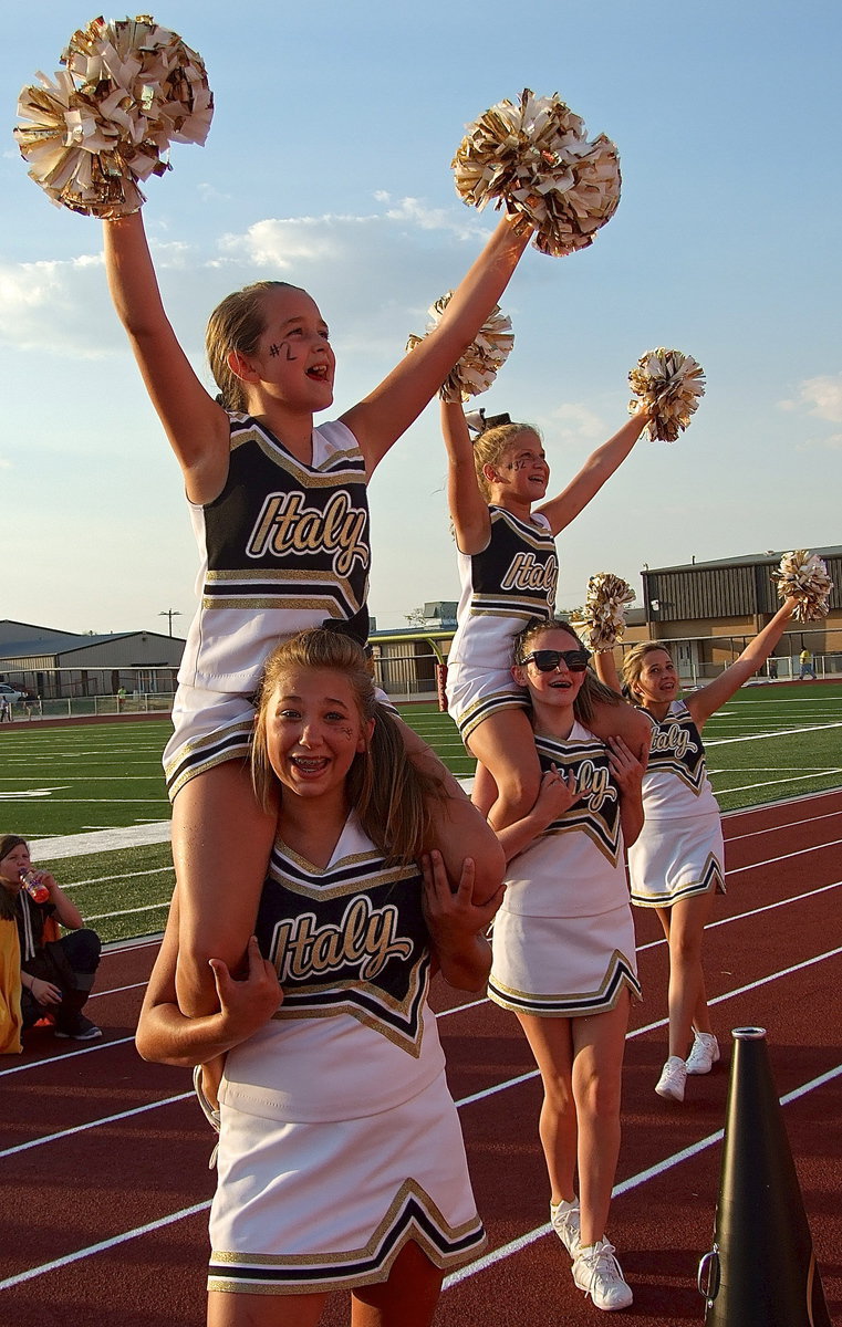 Image: An army of Italy cheerleaders raise the noise level at Panther stadium.