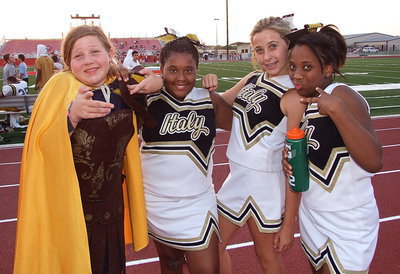 Image: JV Gladiator mascot Tatum Adams and cheerleaders La’Jada Jackson, Hannah Haight and Keondra Jackson take advantage of a photo opportunity.